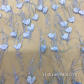 Niebieska haftowana tkanina perłowa z motywem kwiatowym na sukienki